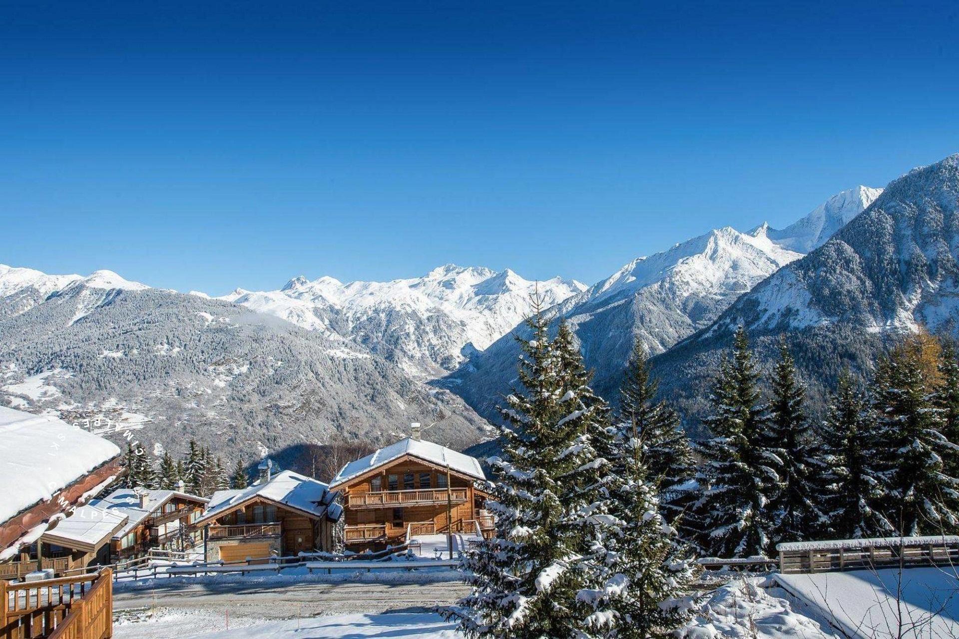 le-1550-iconic-house-courchevel-cheminee-neige-chalet-seminaires-de-caractere